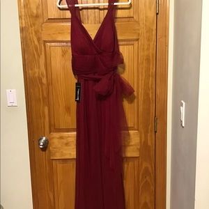 Ever  pretty BRAND NEW Maroon party dress. Tulle belted, never been worned